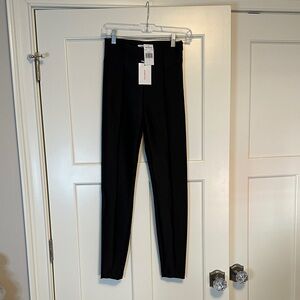 NWT. Good American “Disco” side zip pants in size 1.